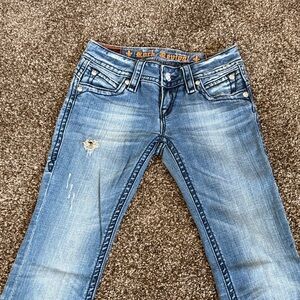 Rock Revival Women's Light Blue Boot Cut Jeans with Subtle Distress